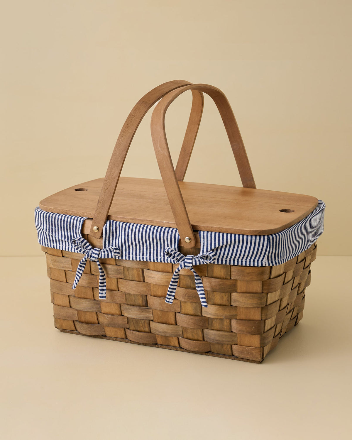 Mavelle Handwoven Picnic Basket with Striped Liner storage basket - Styled in Room
