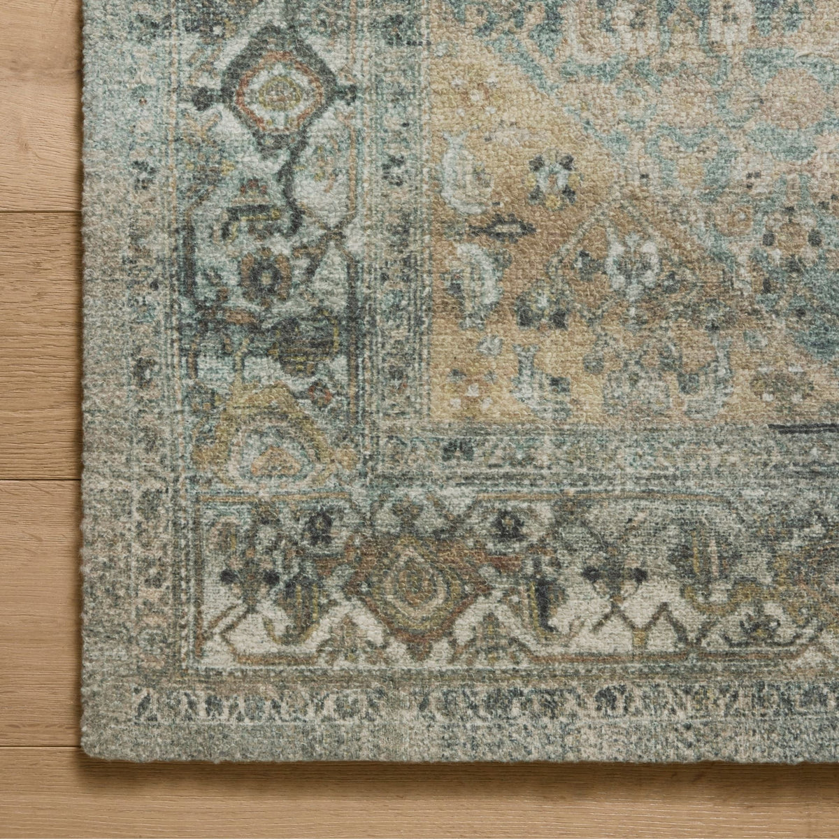 Mavelle Wimberly Lagoon Wheat Rug area rug - Styled in Room