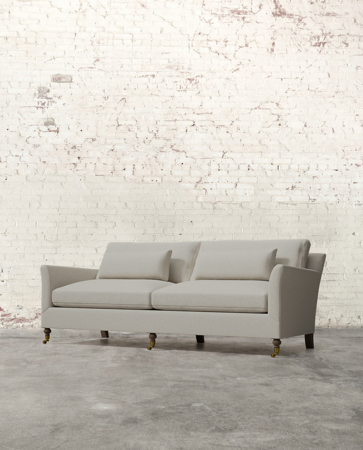 Mavelle Alfie 87" Sofa with Brass Casters sofa - Styled in Room