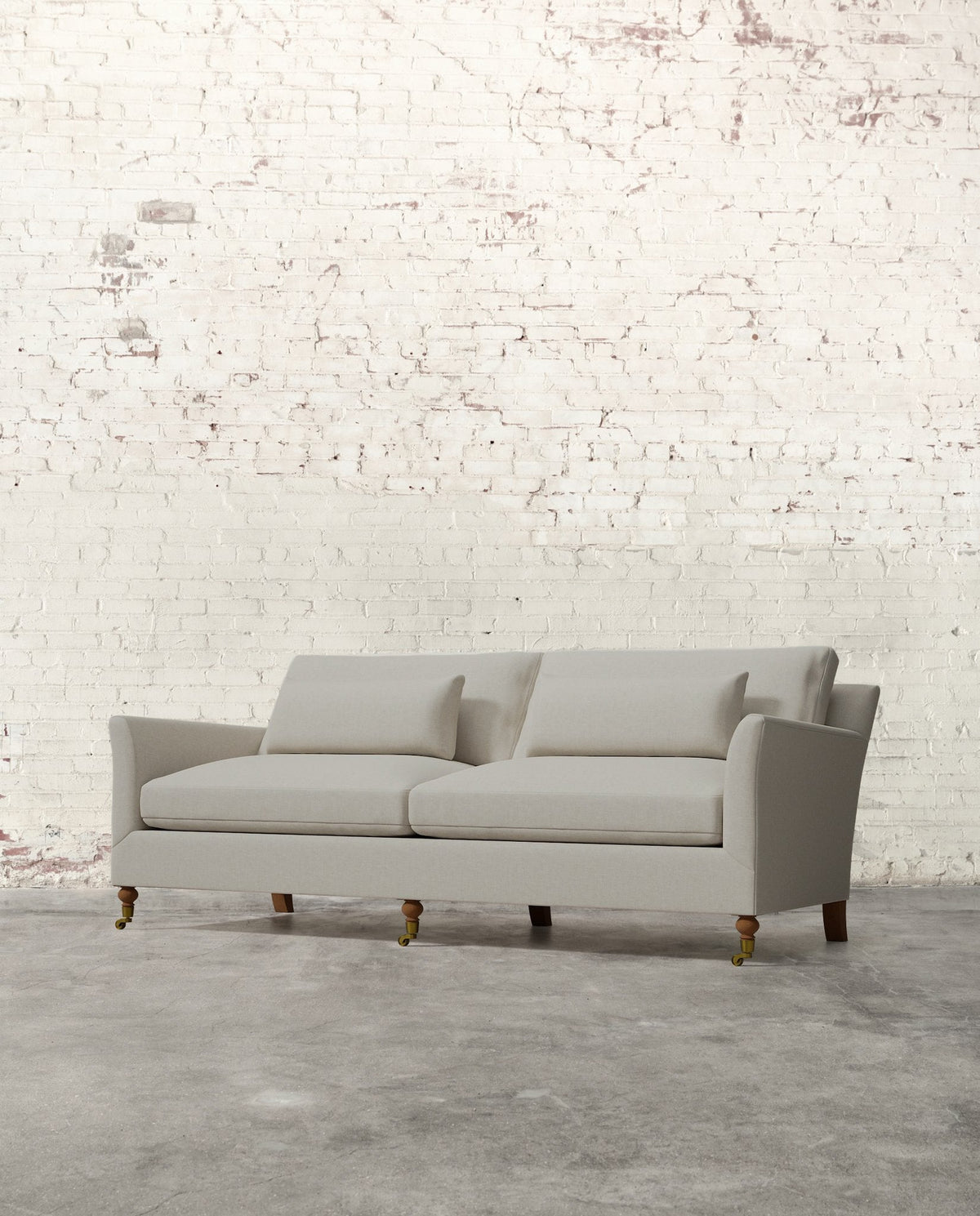 Mavelle Alfie 87" Sofa with Brass Casters sofa - Side View