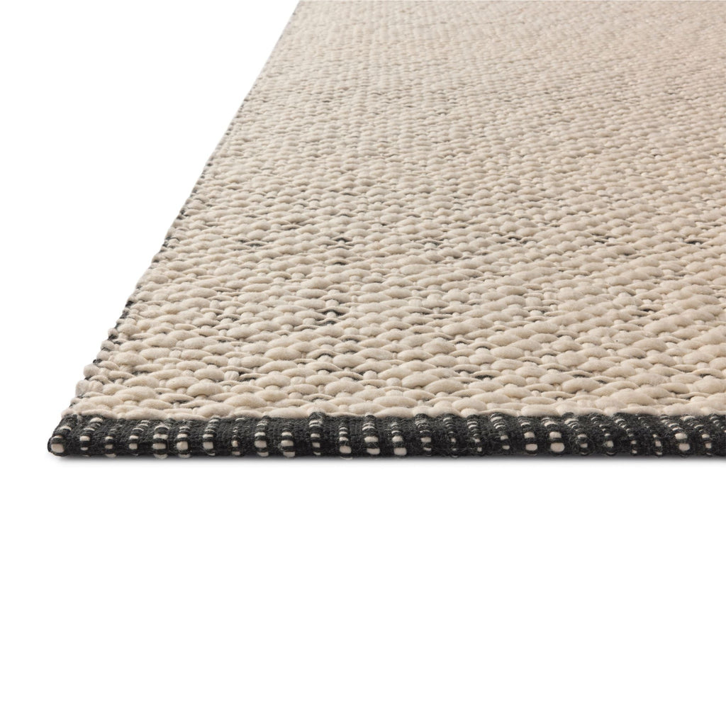 Mavelle Betty Ivory Black Rug area rug - Styled in Room