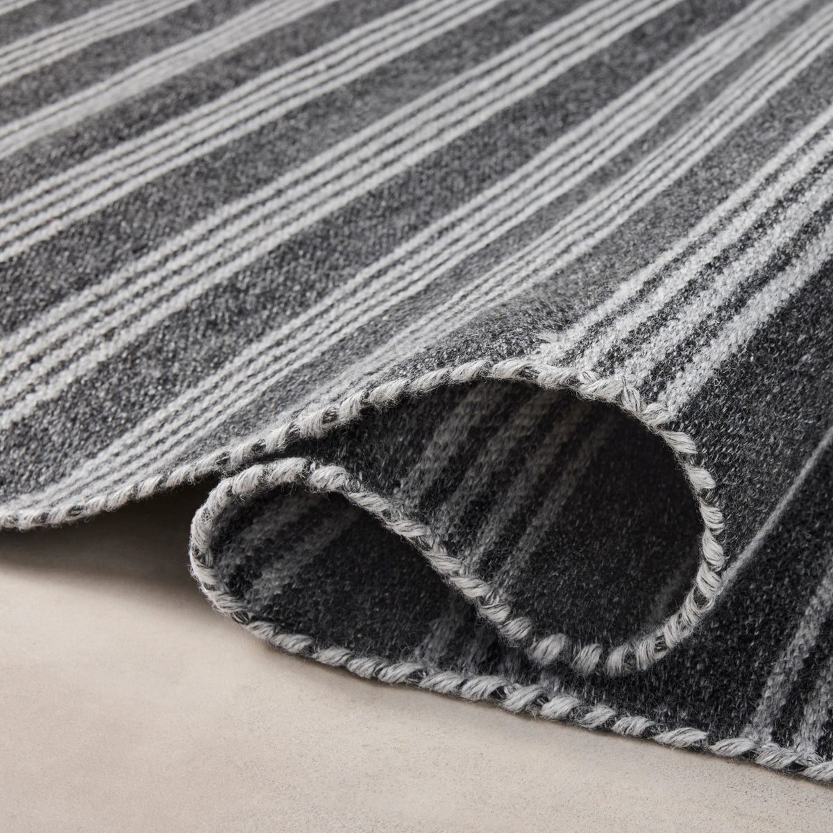 Mavelle Charlie Charcoal Grey Rug area rug - Styled in Room
