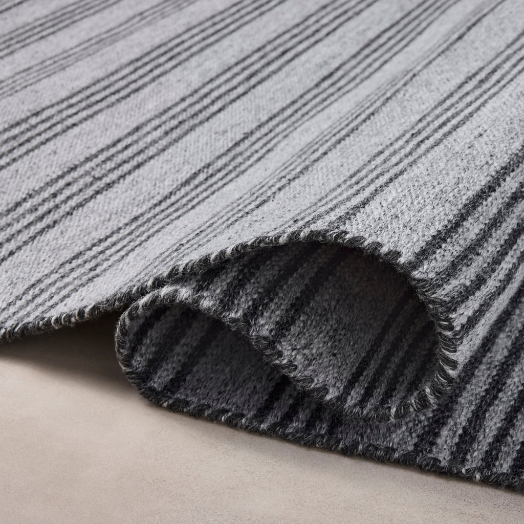 Mavelle Charlie Dove Charcoal Rug area rug - Styled in Room