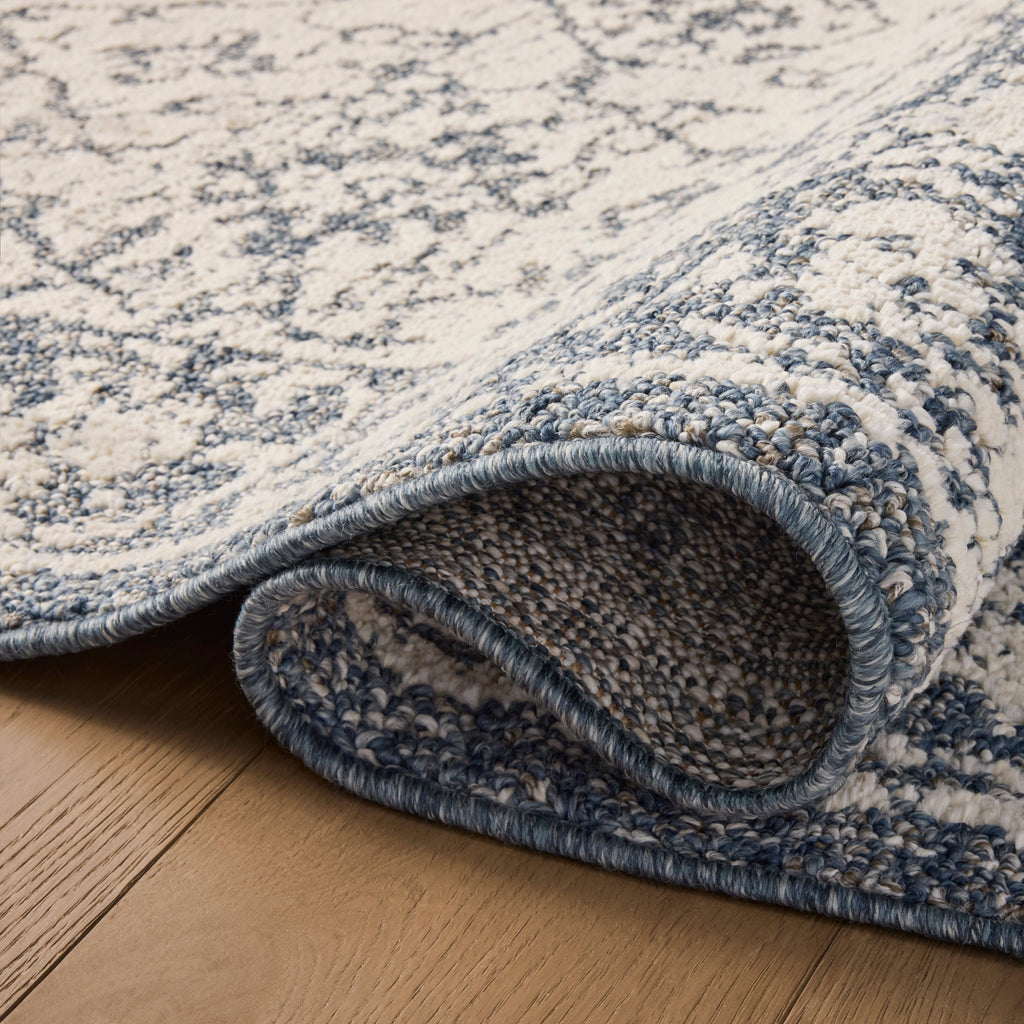 Mavelle Gigi Ivory Blue Rug area rug - Styled in Room