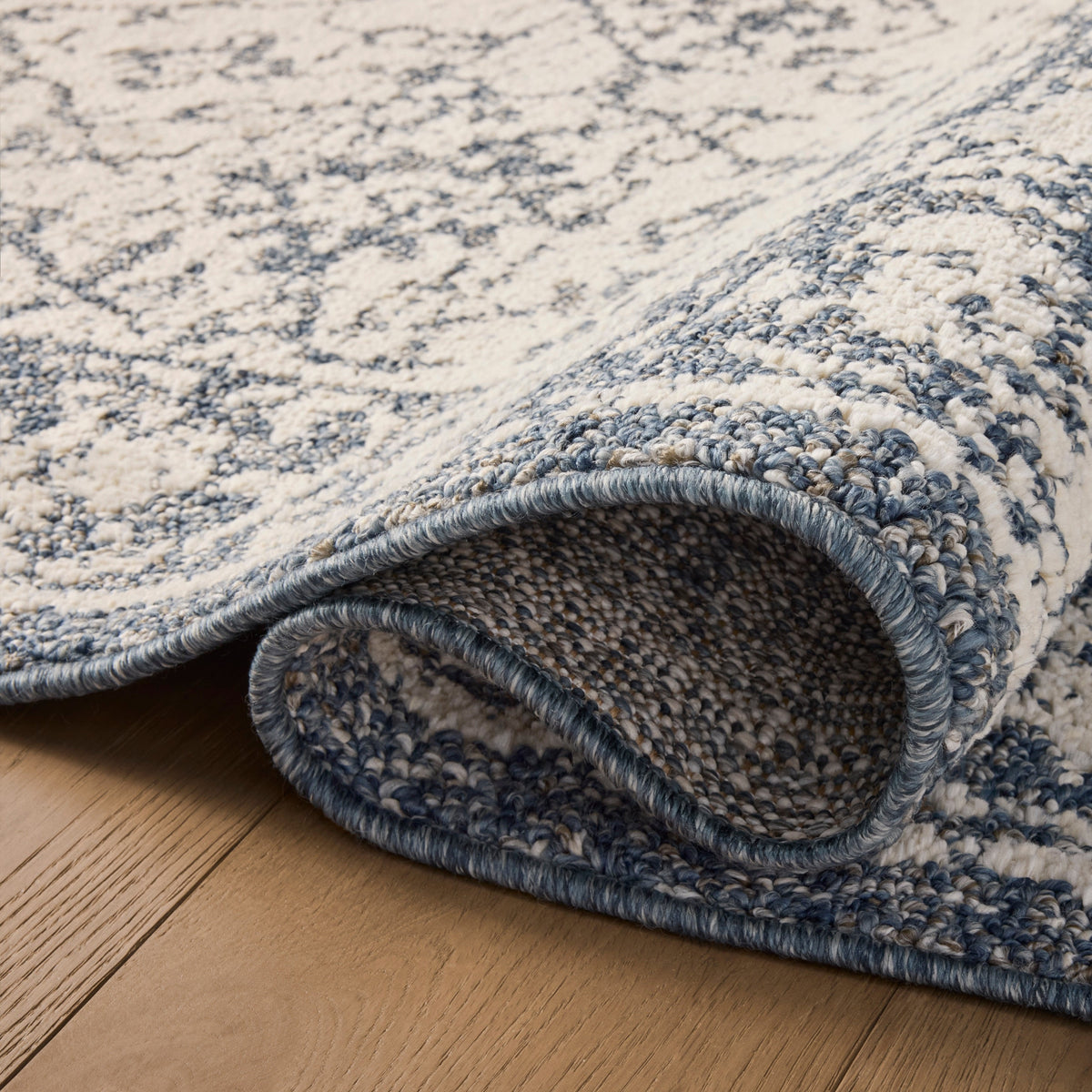 Mavelle Gigi Ivory Blue Rug area rug - Styled in Room
