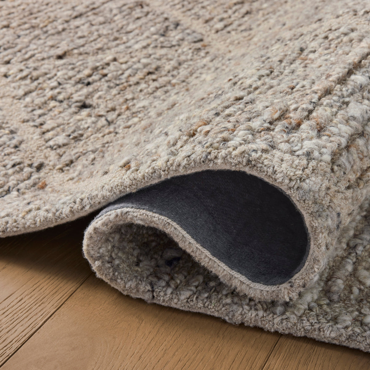 Mavelle Jones Pebble Rug area rug - Styled in Room