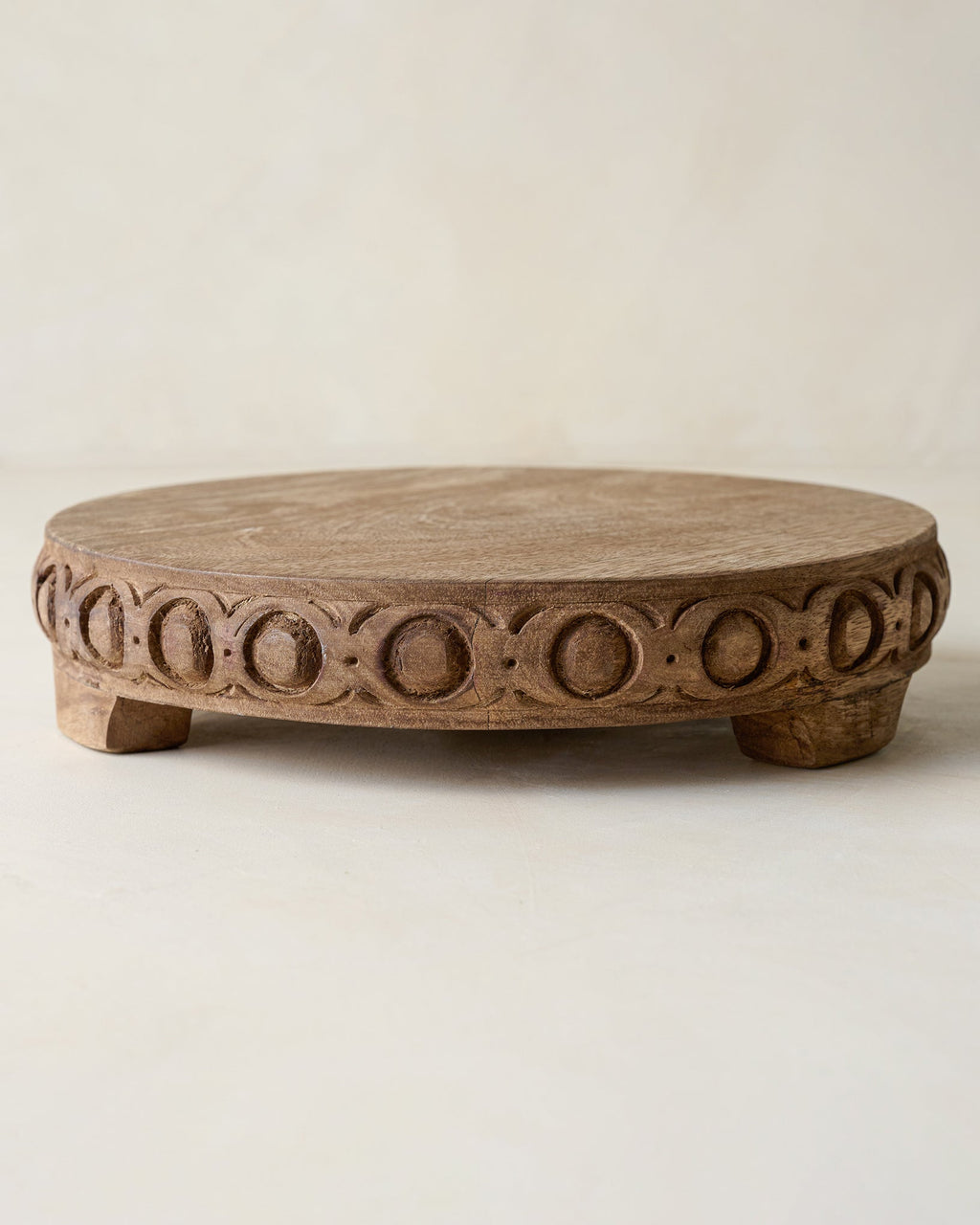 Mavelle Antiqued Carved Wood Round Riser decorative accent - Close-Up