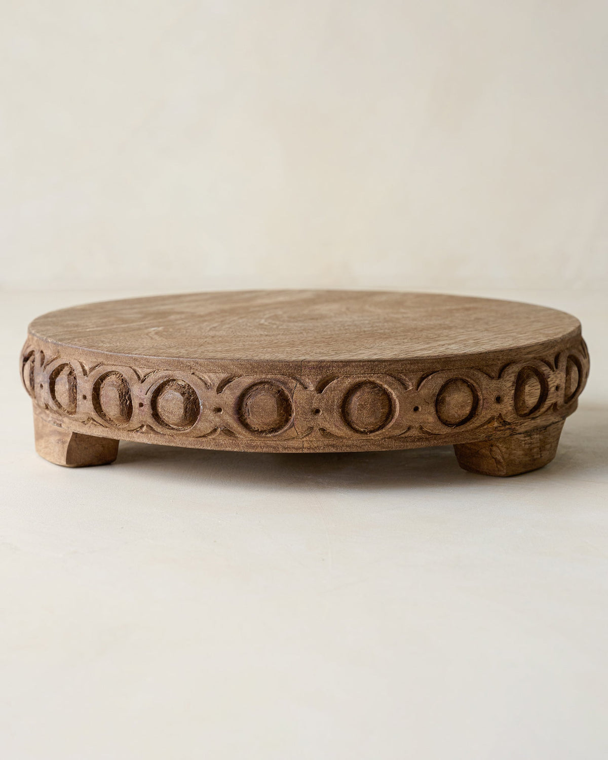 Mavelle Antiqued Carved Wood Round Riser decorative accent - Close-Up