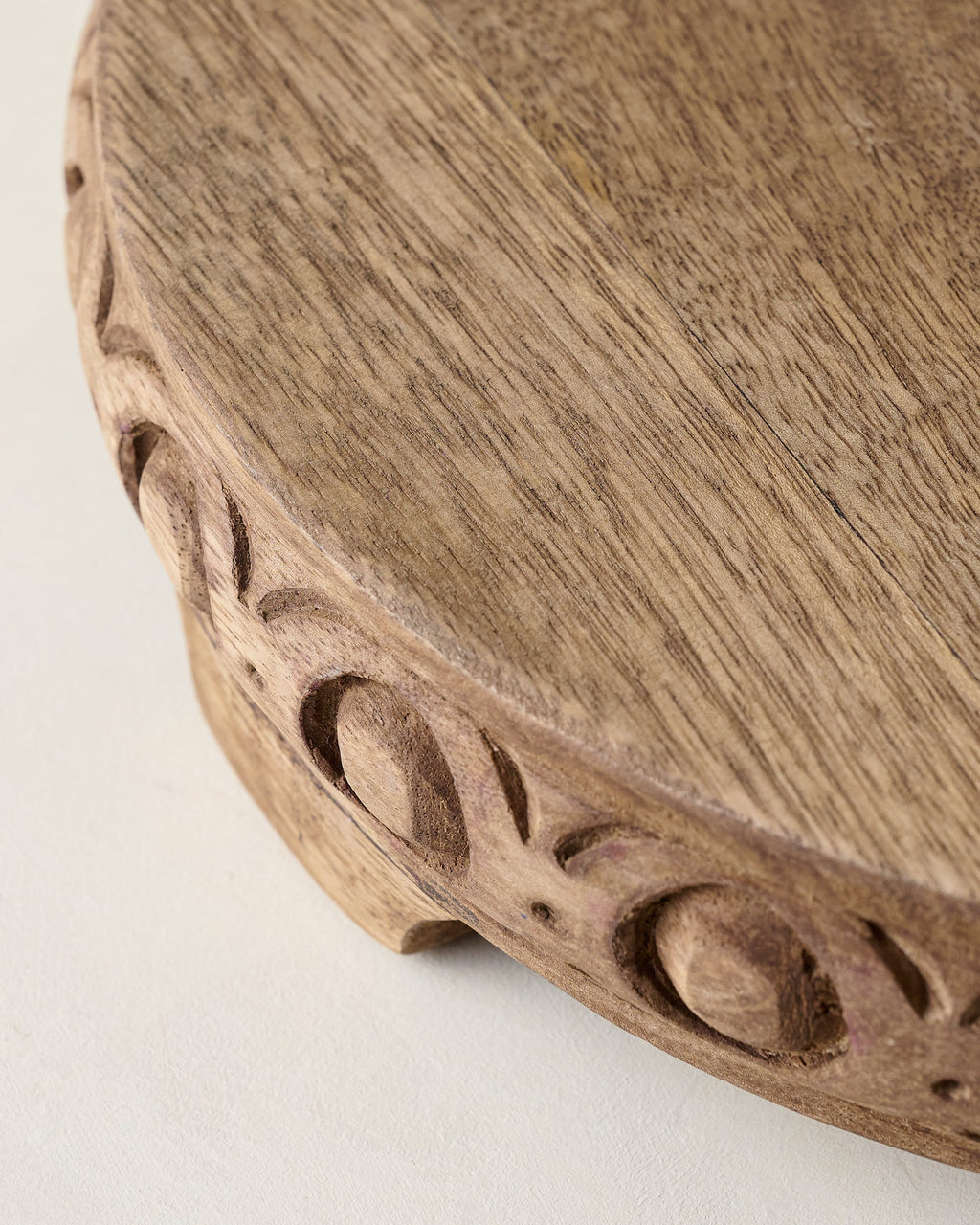 Mavelle Antiqued Carved Wood Round Riser decorative accent