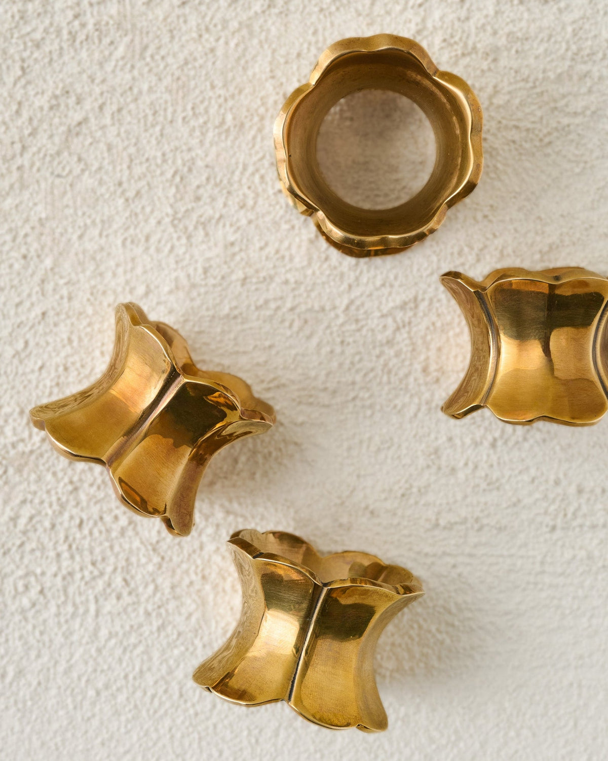 Mavelle Antique Brass Ruffle Napkin Ring Set of Four napkin ring set - Detail View