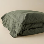 Mavelle Olive Night Clara Eyelet Flange Quilt & Sham Set (King) quilt - Styled in Room