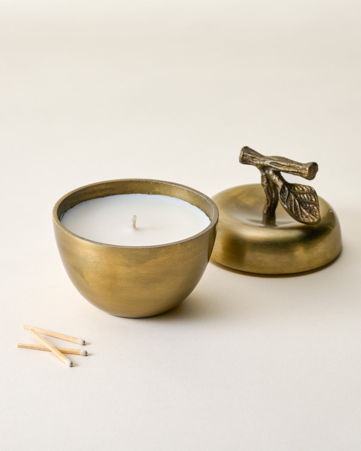 Mavelle Antique Brass Apple Candle candle - Styled in Room
