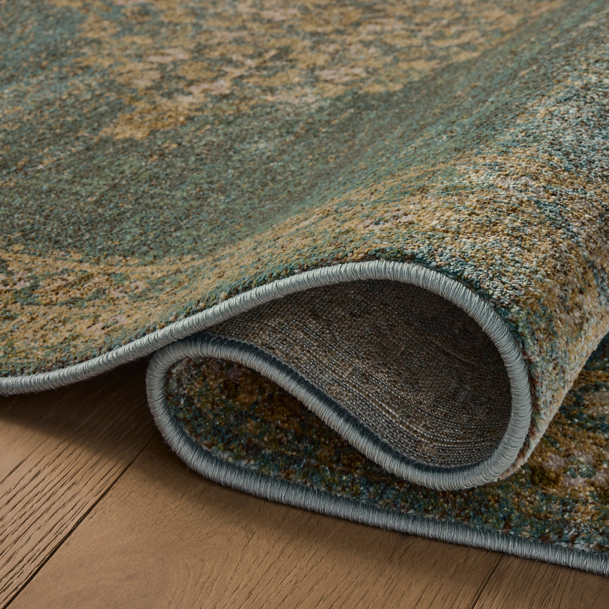 Mavelle Mona Aqua Wheat Rug area rug - Styled in Room
