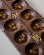 Mavelle Wood and Brass Inlay Star Mancala decorative accent - Styled in Room