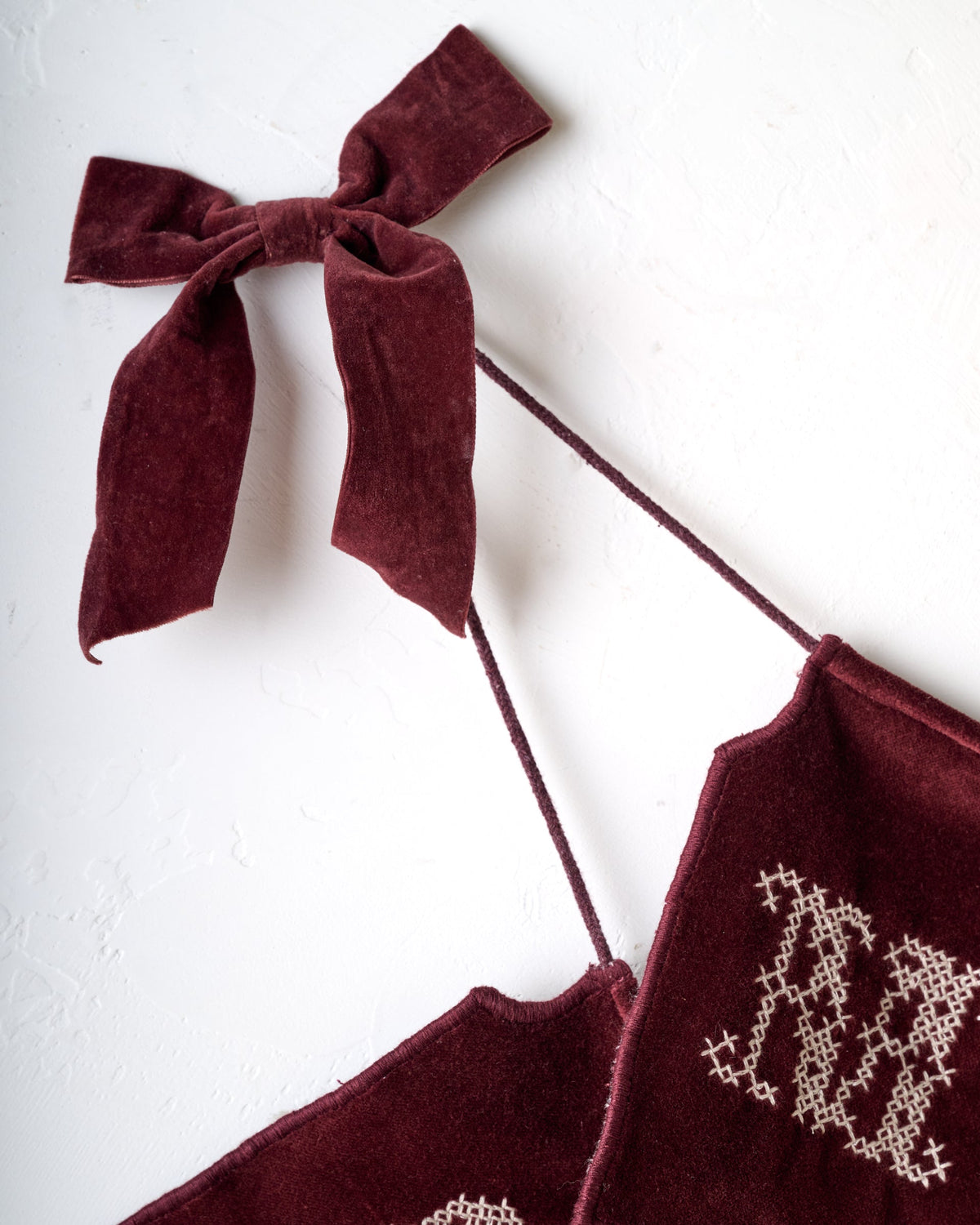 Mavelle Embroidered Merry Christmas Velvet Garland wreath - Styled in Room
