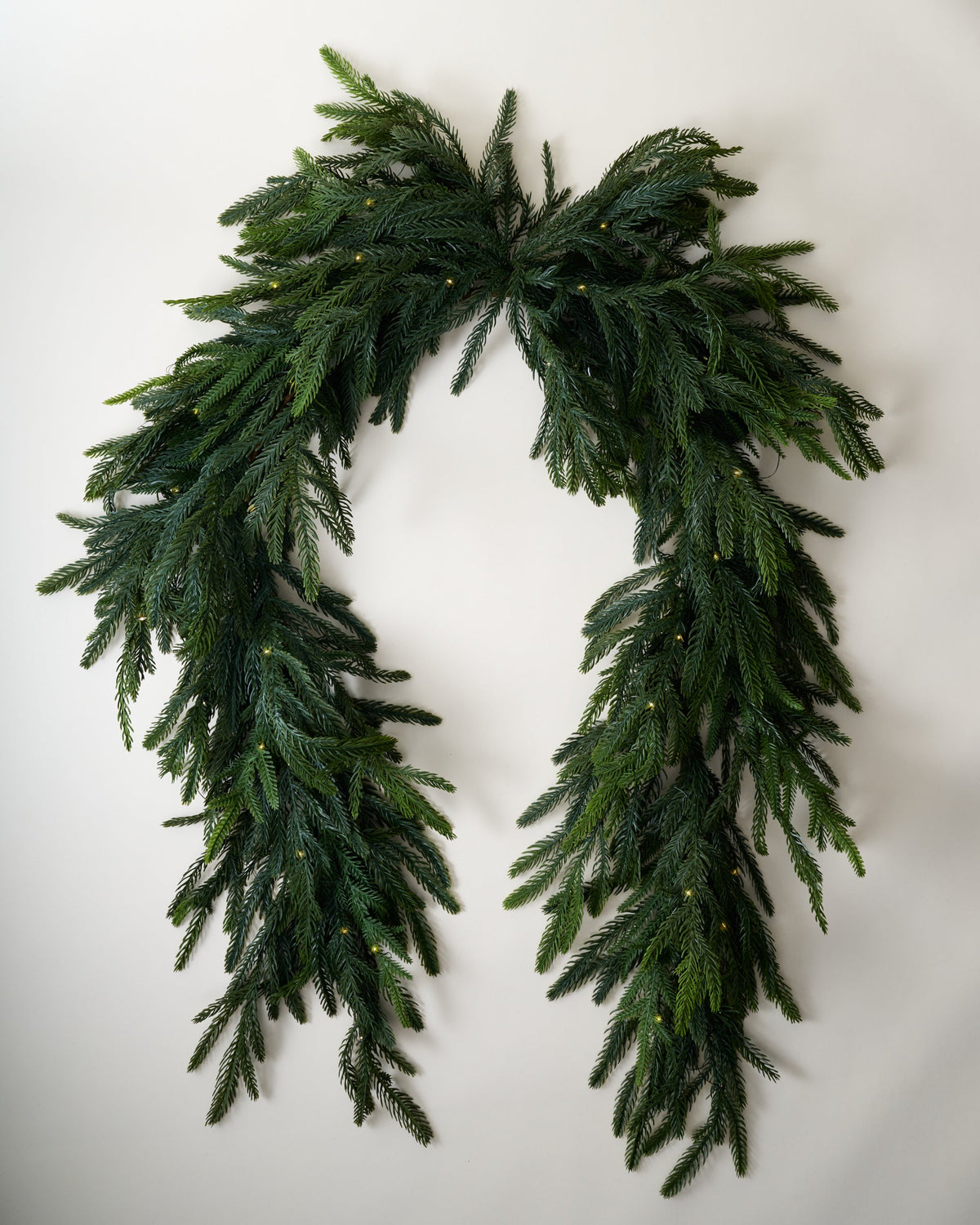Mavelle Real Touch Norfolk Pine Pre-Lit Mantel Swag - 72" faux floral stem - Detail View
